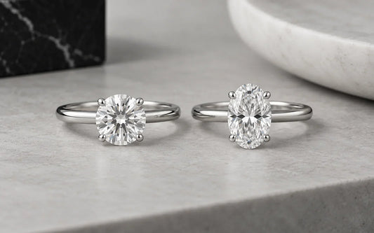 Round and oval moissanite solitaire rings shown side by side