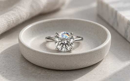 Moissanite ring showing a subtle iridescent oil slick surface film